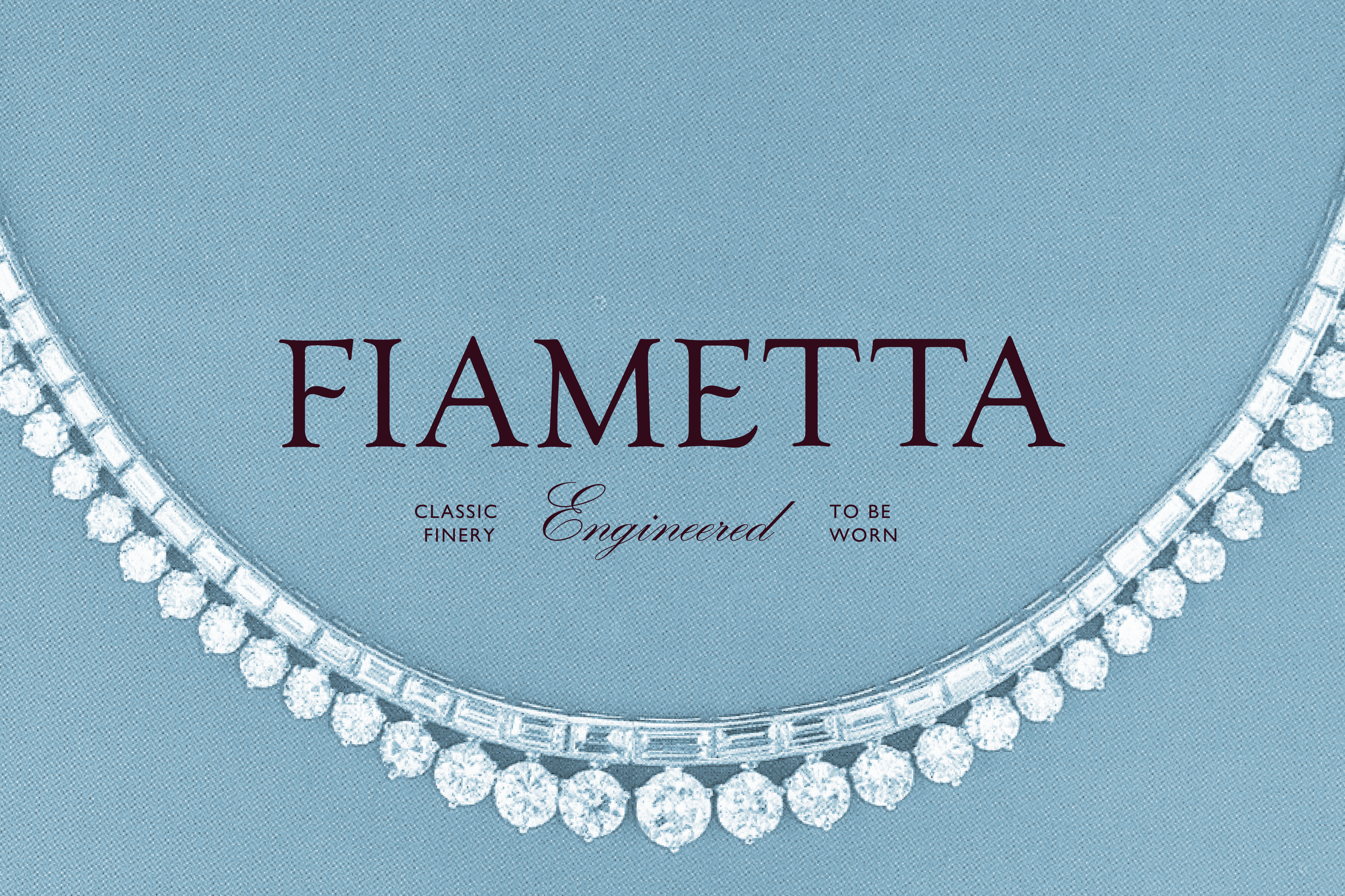 Diamond necklace with round and baguette cuts on a light blue background, "FIAMETTA" text.