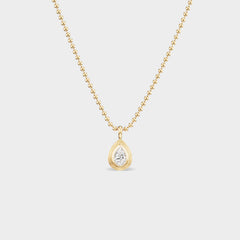 Pear Bezel Charm with lab-grown diamond on a 14K yellow gold chain