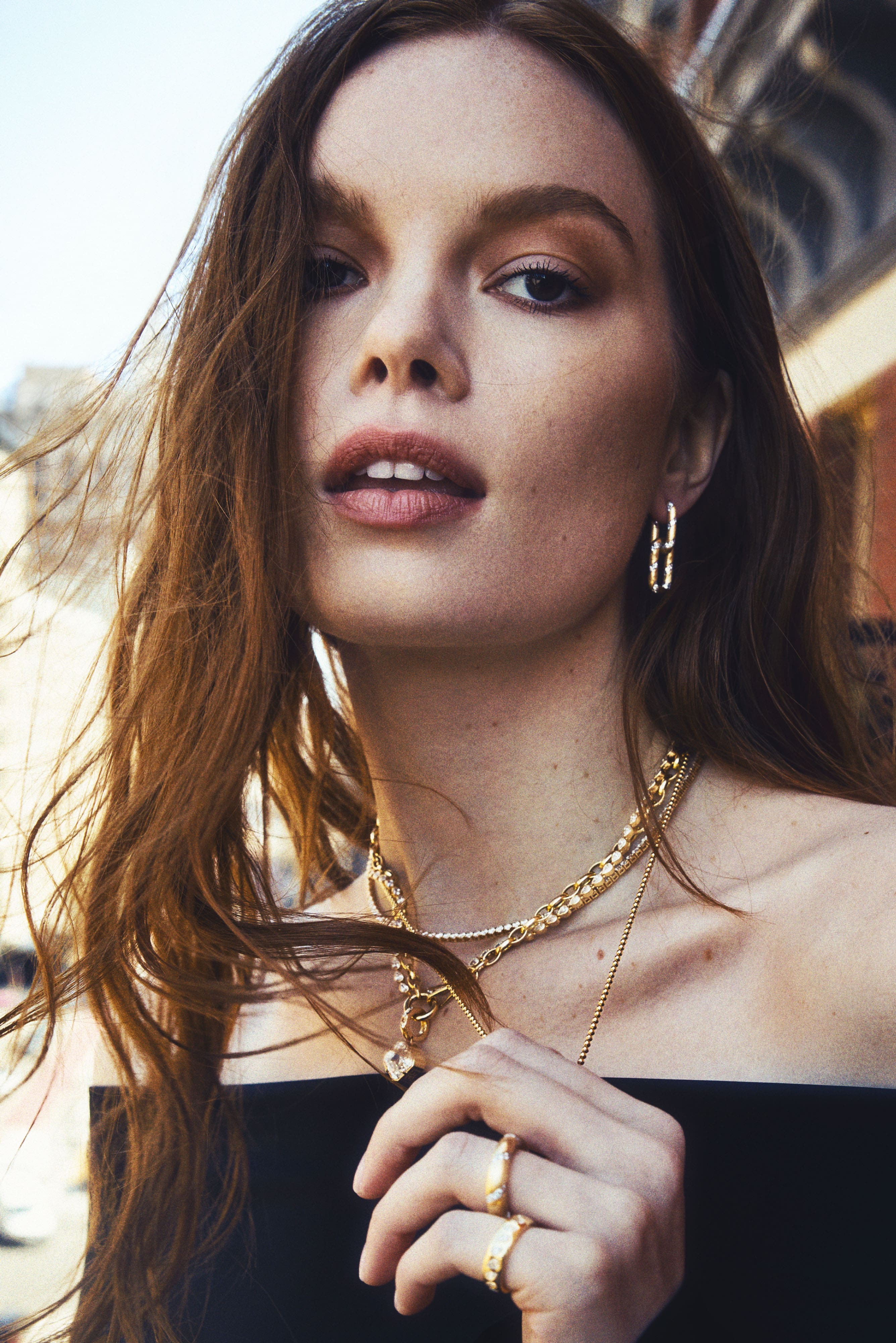 Model wearing 14k yellow gold Double Link Earrings with lab-grown diamonds, ideal for everyday wear or an ear stack.