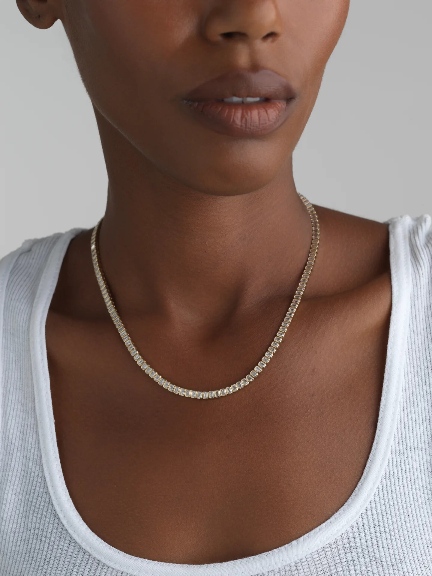 14K gold Emerald Bezel Tennis Necklace with lab-grown diamonds, perfect for everyday elegance.