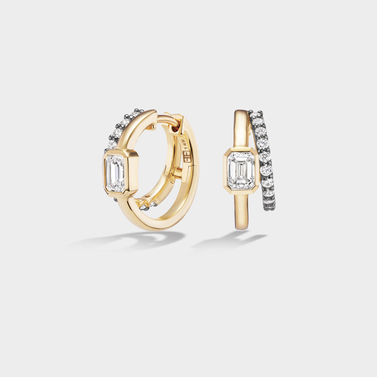 Yellow gold double huggie earrings with emerald-cut lab diamonds and pavé diamonds, perfect for an ear stack.