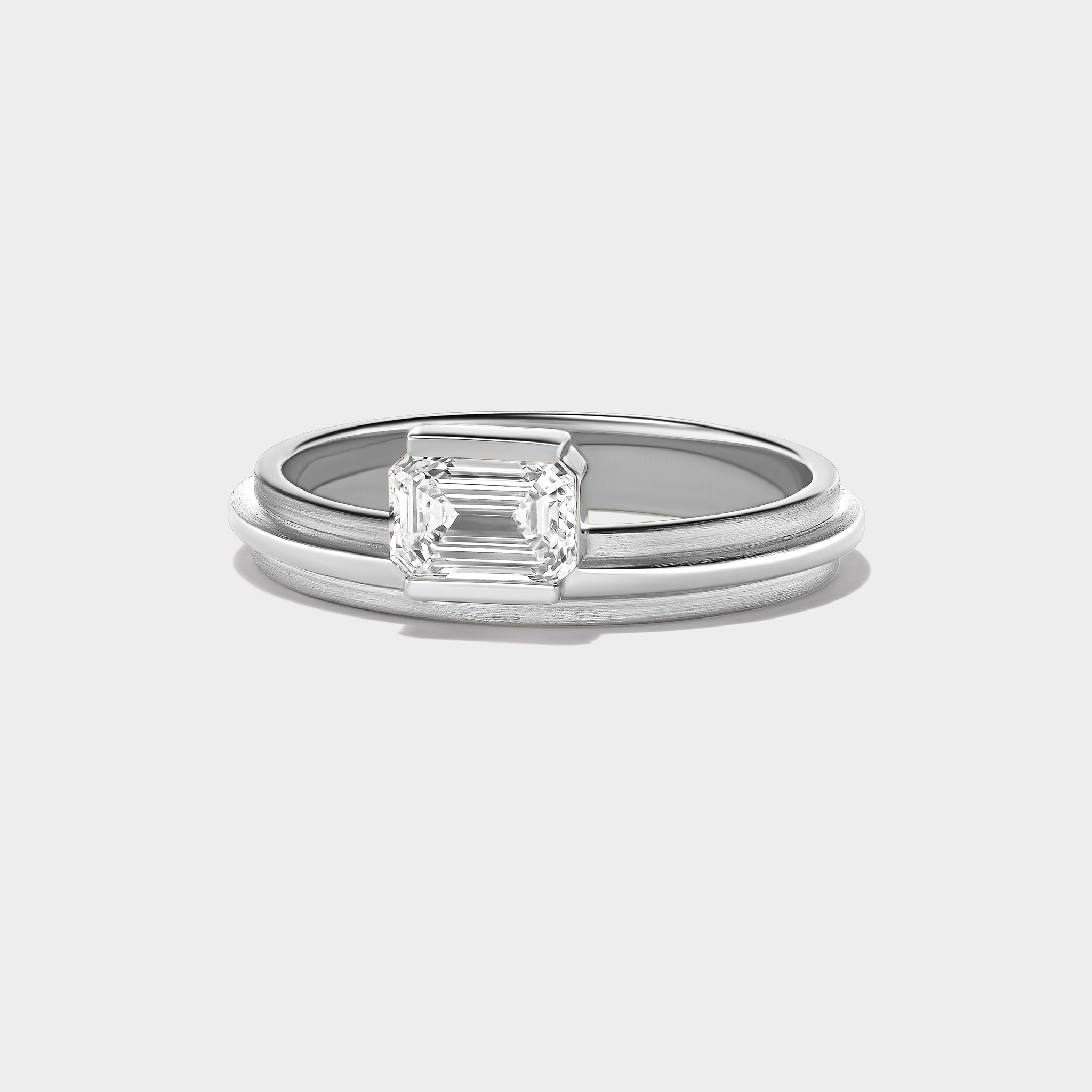 14K gold Emerald Lovers Ring with a prominent emerald-cut lab-grown diamond, perfect for stacking.