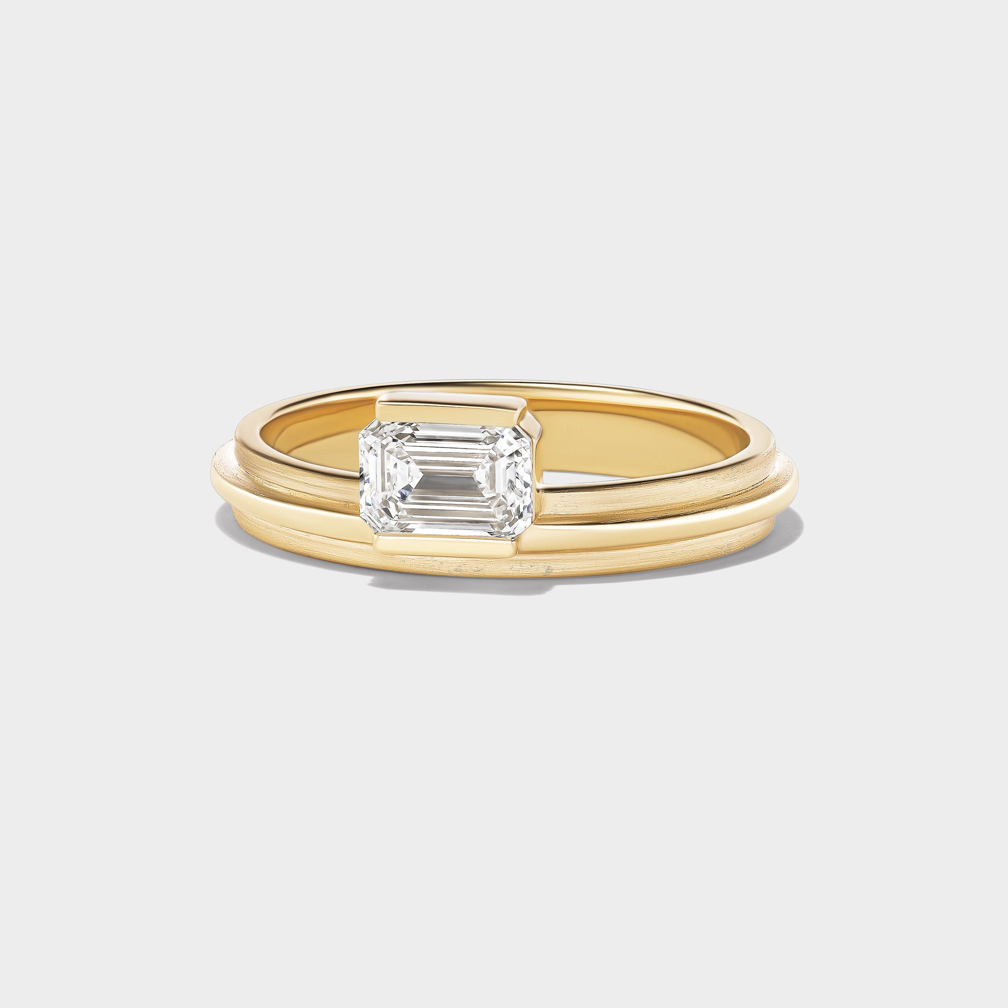 14K gold Emerald Lovers Ring with a .71 carat emerald-cut lab-grown diamond, ideal for stacking.
