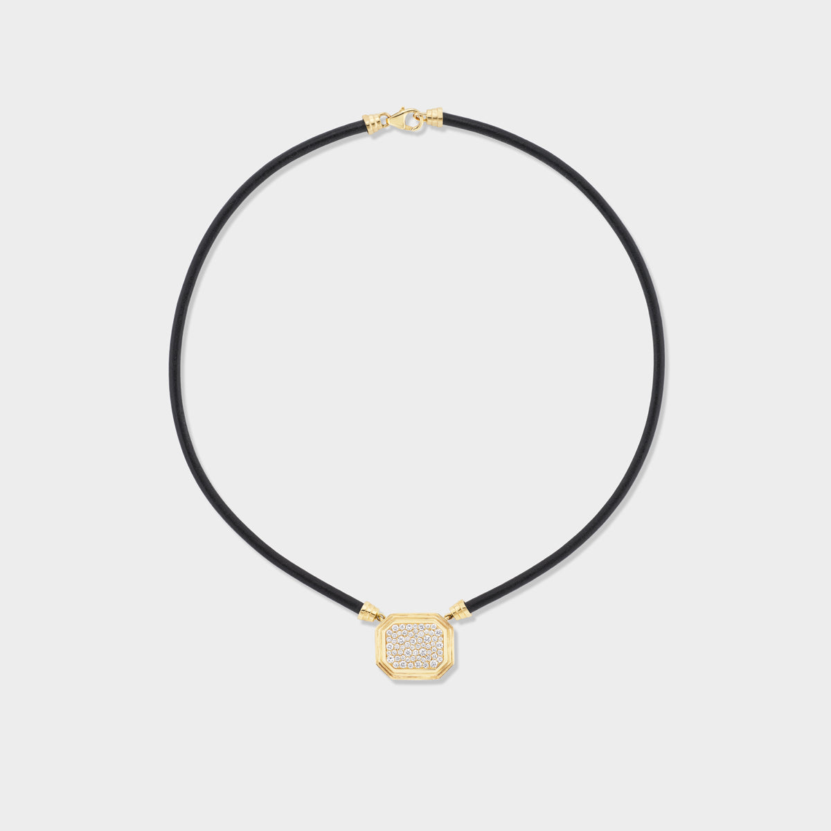 Full view of Fiametta triple bezel pavé pendant on leather cord in 14k recycled yellow gold with pavé diamond accents for the modern collector looking for a unique statement piece for every day. Fiametta modern luxury fine jewelry combines old-world craftsmanship with ethical lab-grown diamonds for the modern collector with a unique point of view.