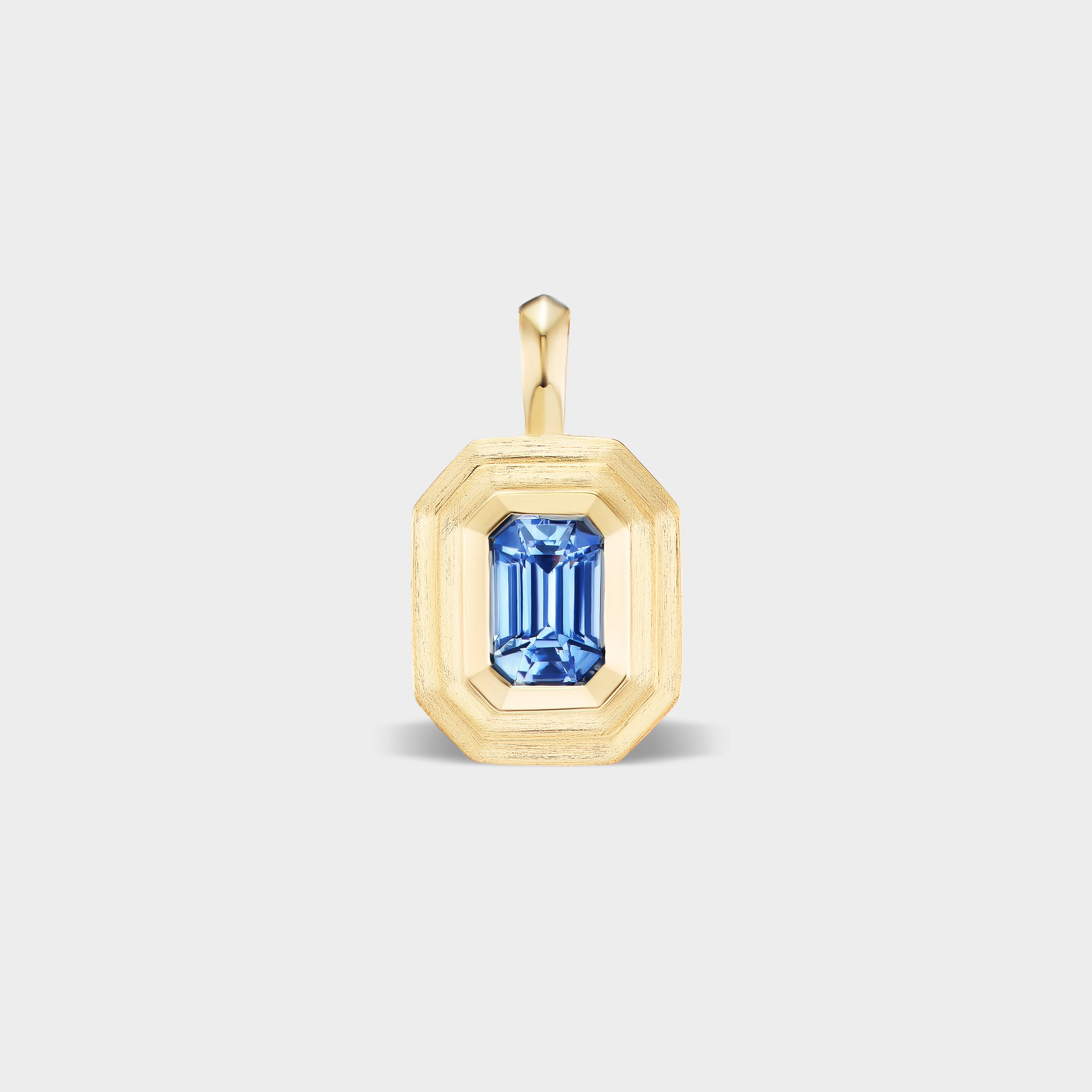Mini 14K gold emerald-cut natural blue sapphire bezel charm with mixed finish, perfect for everyday wear.