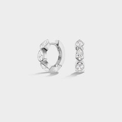 Everyday mini 14K white gold huggie earrings with bezel-set pear-cut lab-grown diamonds, ideal for an ear stack.