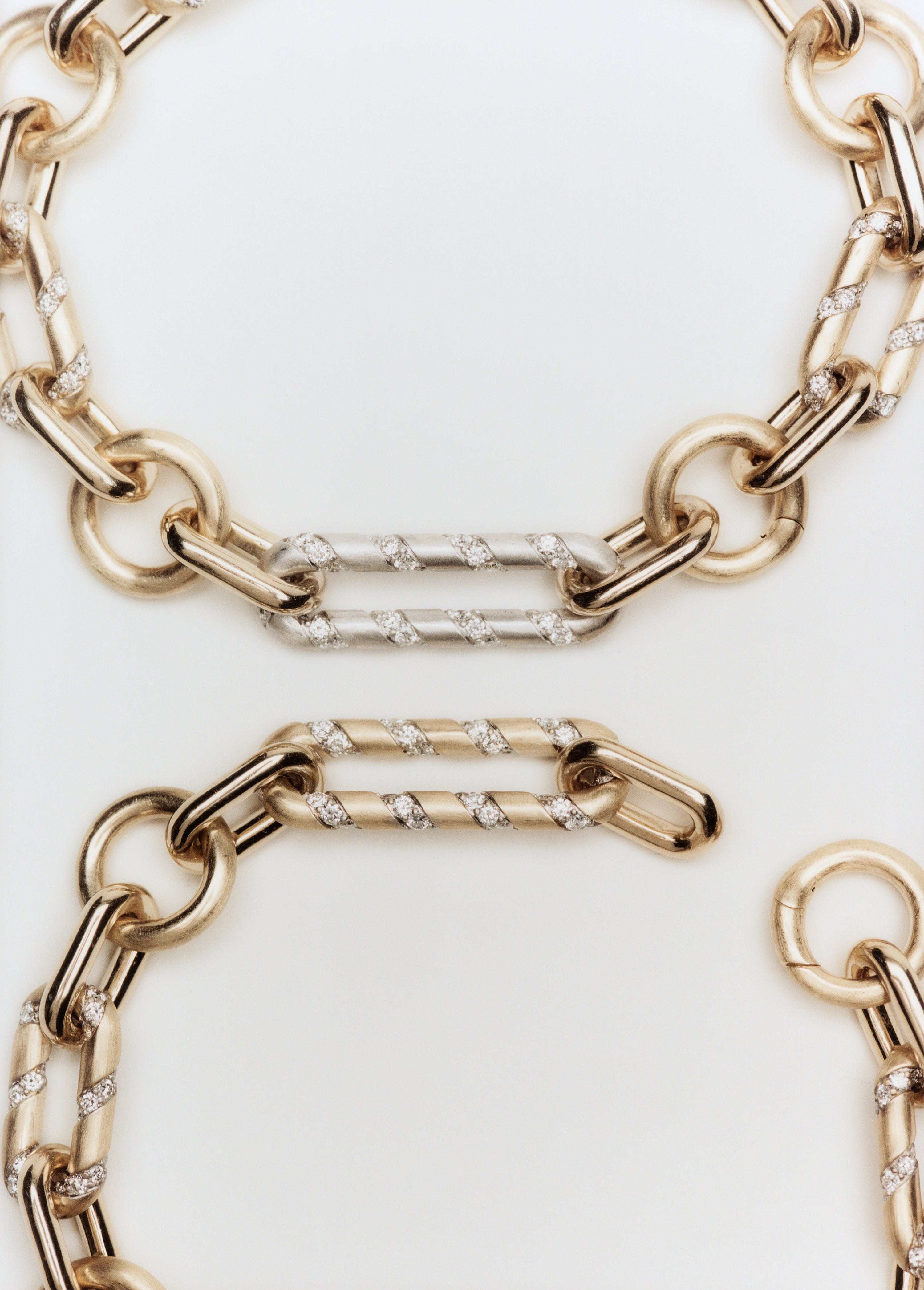 Mixed link bracelet in 14k yellow and white gold with lab-grown diamond links and a mixed finish.