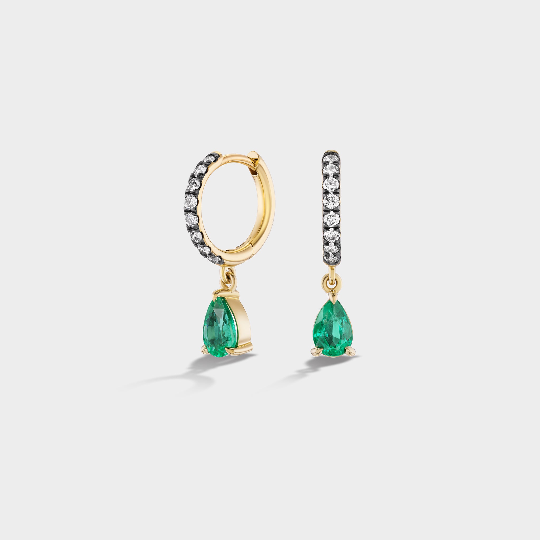14K yellow gold pavé huggies with pear-cut emeralds and lab-grown diamonds, perfect for everyday wear or stacking.