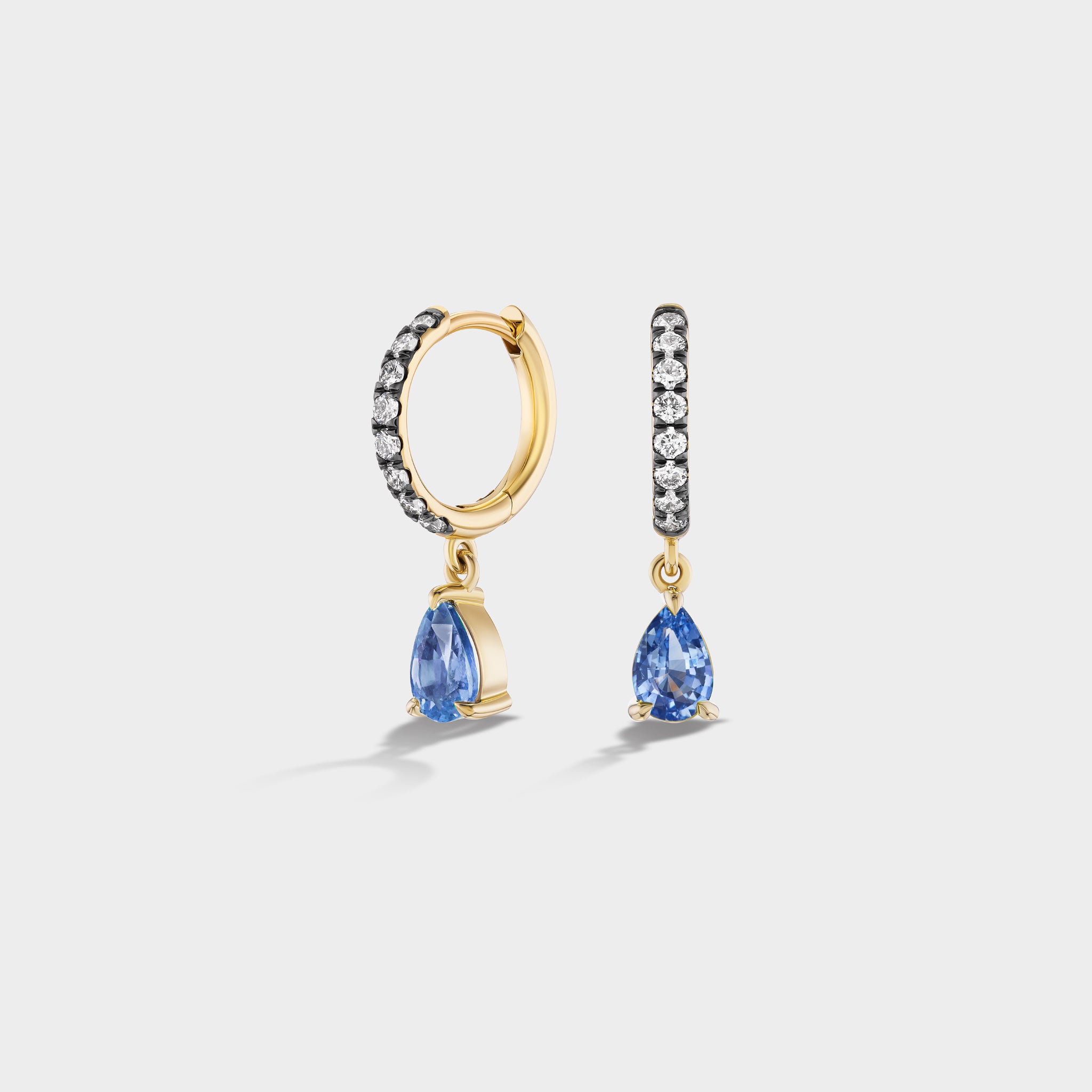 14K yellow gold pavé huggies with antique finish, pear-cut blue sapphires, and lab-grown diamonds, perfect for stacking.