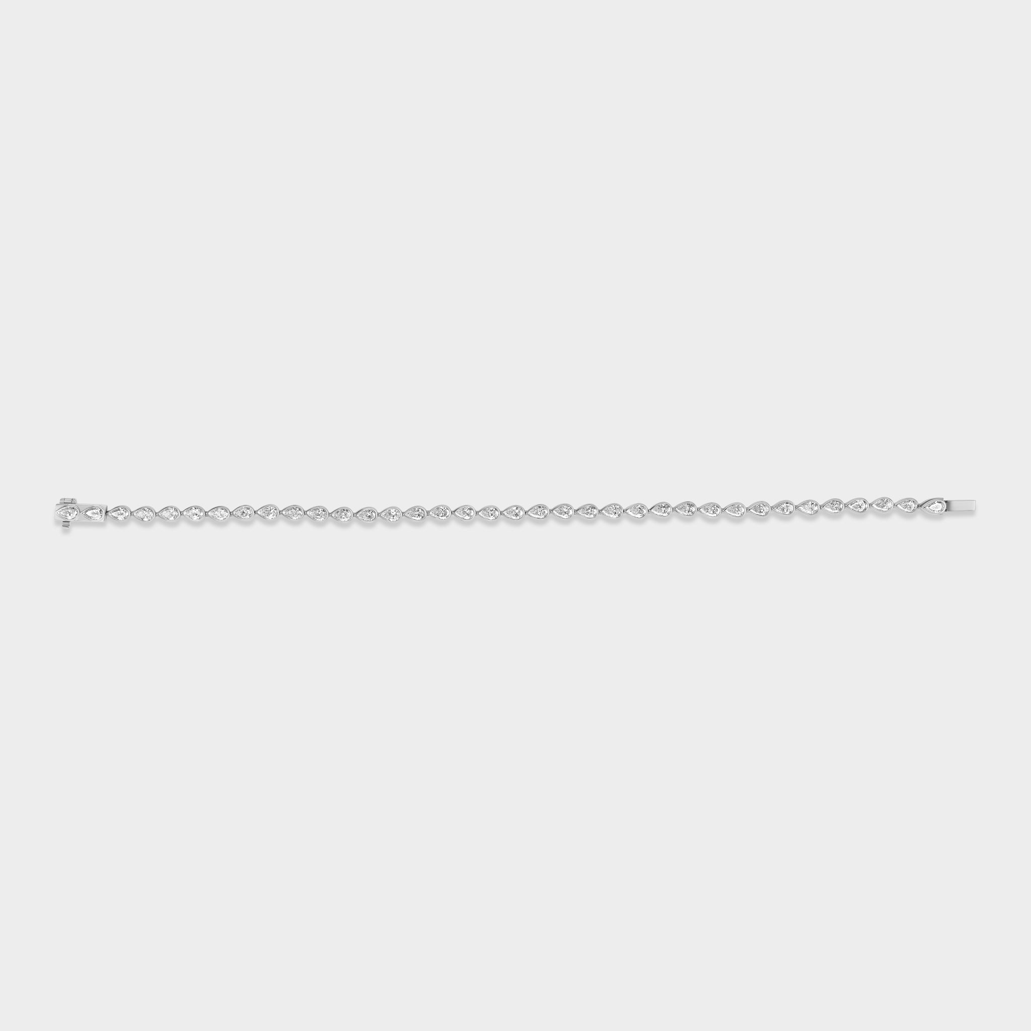 14K gold pear-cut lab-grown diamond bezel tennis bracelet, perfect for everyday wear or stacking.