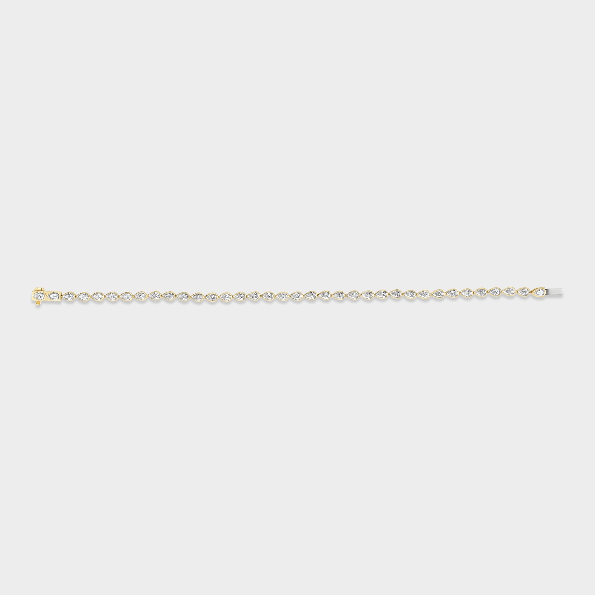 14K gold pear-cut lab-grown diamond bezel tennis bracelet, perfect for everyday wear or stacking.