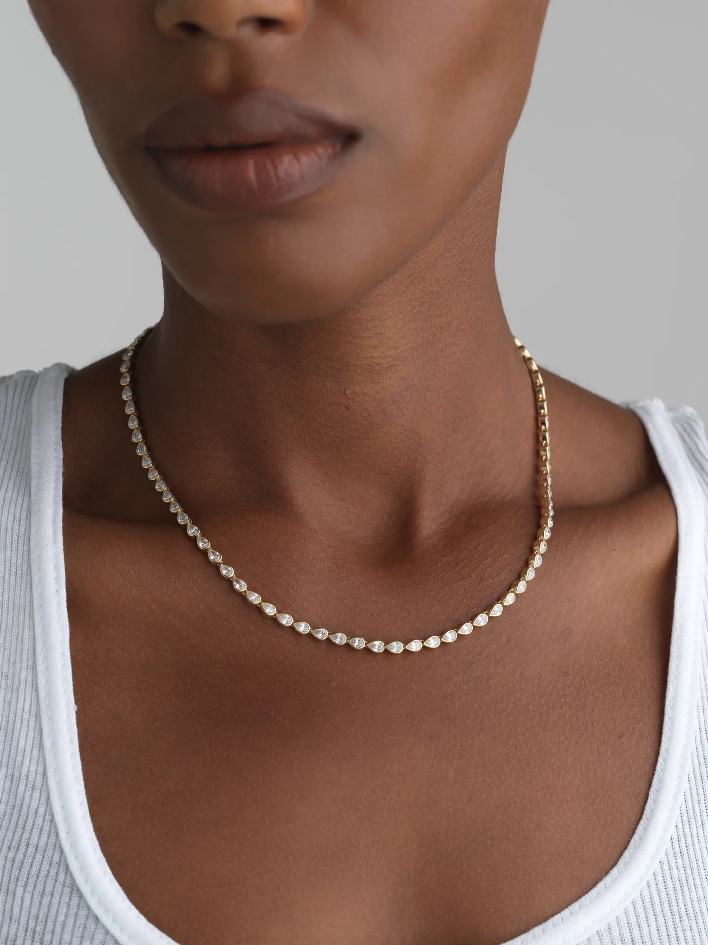 14K gold pear bezel tennis necklace with lab-grown diamonds, perfect for everyday elegance.