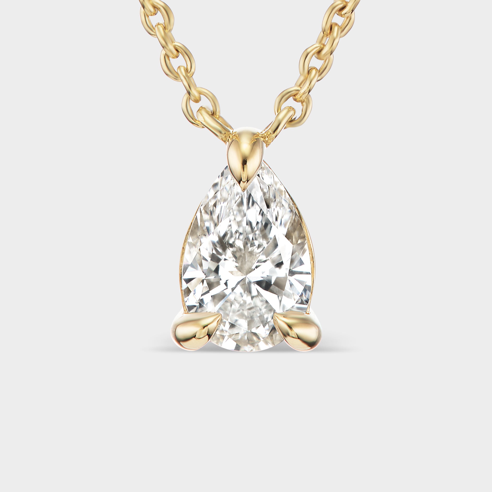 14K yellow gold Pear Prong Pendant with a lab-grown diamond, ideal for everyday wear or layering.