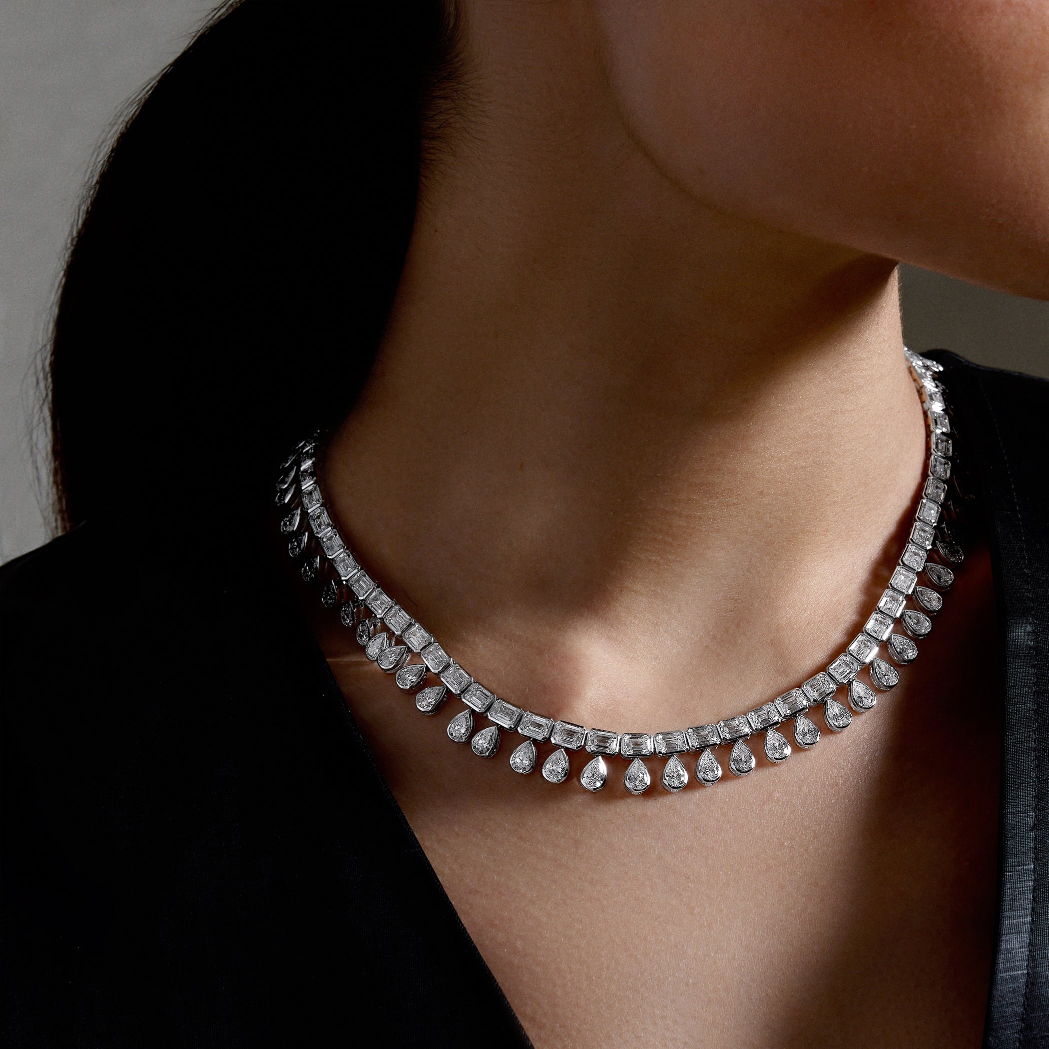 14K white gold Duality Necklace with emerald and pear-cut lab-grown diamonds, perfect for special occasions.